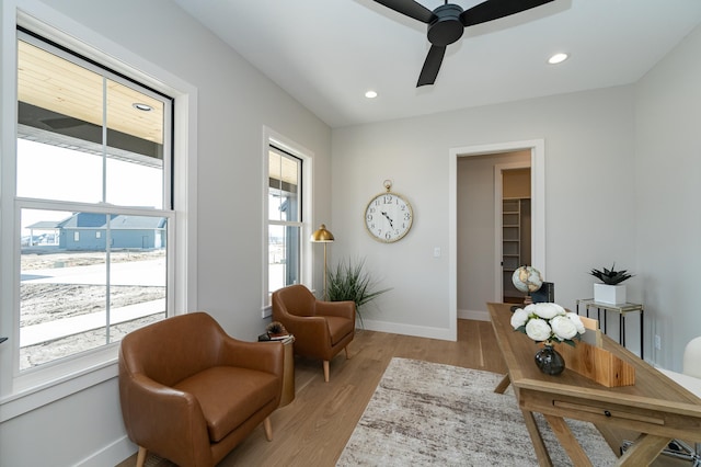 sitting room featuring recessed lighting, baseboards, light wood-style floors, and a ceiling fan