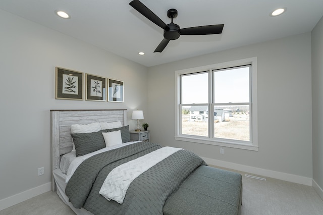 carpeted bedroom with recessed lighting, a ceiling fan, and baseboards