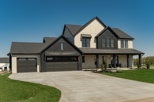 2727 Mayo Prairie Ln SW, Rochester Twp, MN 55902 - modern inspired farmhouse featuring board and batten siding, driveway, a front lawn, and covered porch