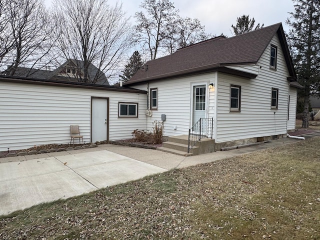 rear view of property with a patio area