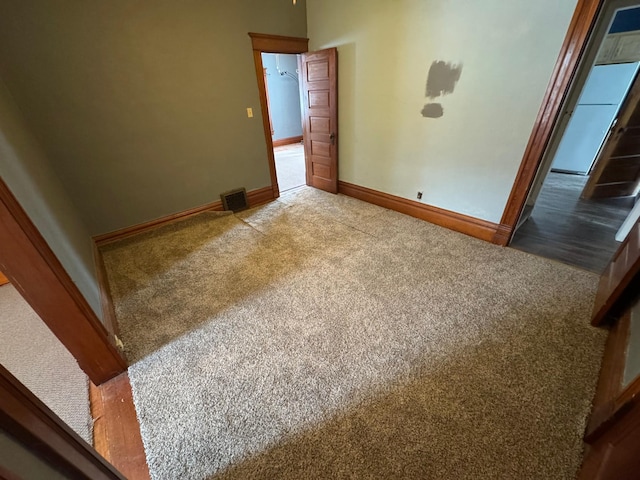 unfurnished bedroom with carpet floors