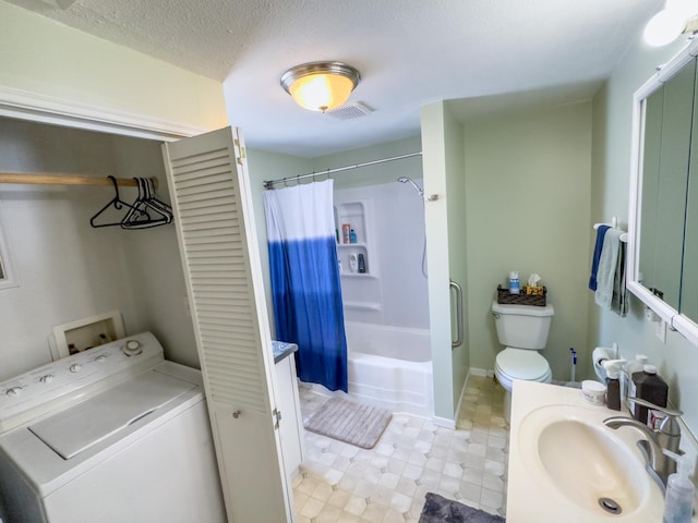 full bathroom with a textured ceiling, vanity, shower / tub combo with curtain, washer / clothes dryer, and toilet