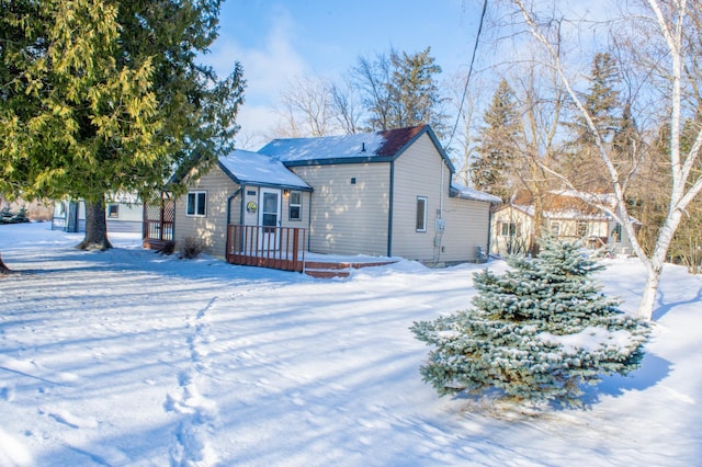 view of snow covered house