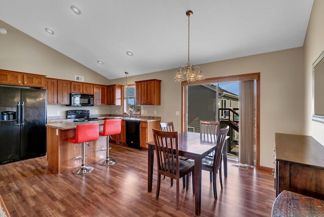 dining room featuring baseboards, an inviting chandelier, dark wood-style floors, and a healthy amount of sunlight