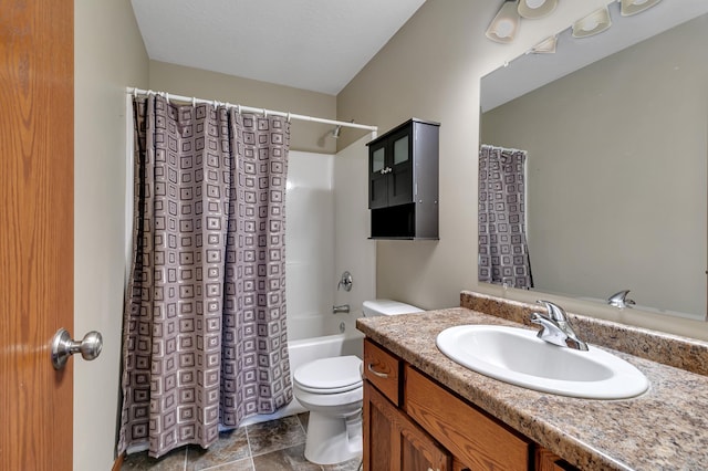 bathroom featuring shower / tub combo with curtain, toilet, and vanity