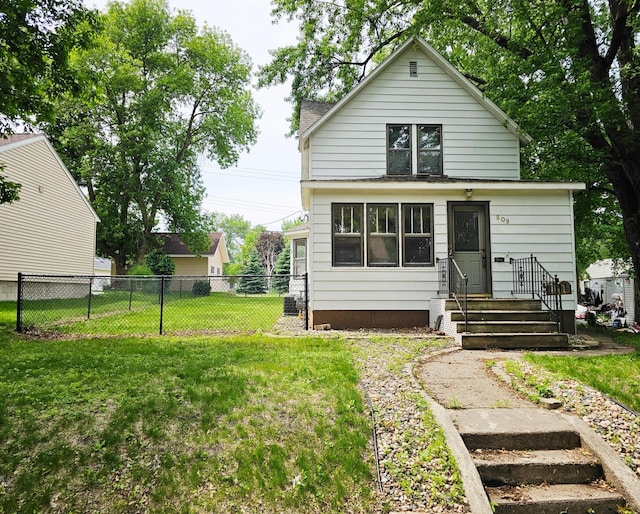 809 7th St, Montevideo, MN 56265 - back of house featuring entry steps