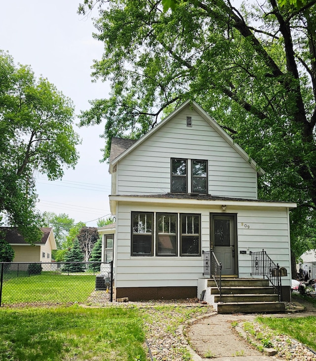 809 7th St, Montevideo, MN 56265 - view of front facade featuring central AC unit