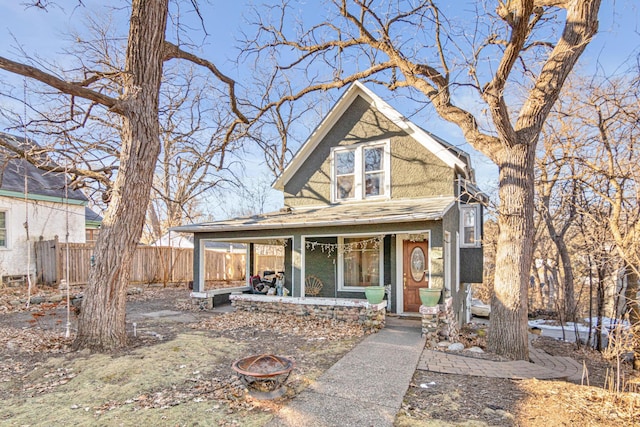 view of front of home with a fire pit