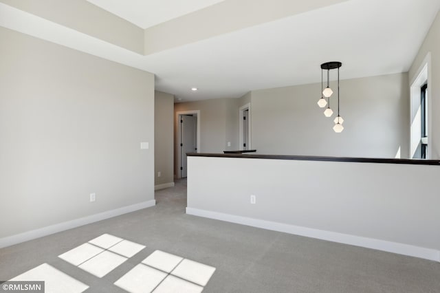 empty room featuring light colored carpet