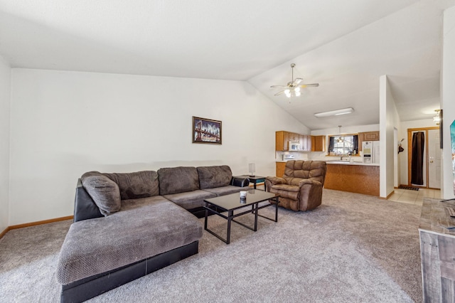 983 County Road D E, Vadnais Heights, MN 55109 - living area featuring light carpet, baseboards, vaulted ceiling, and a ceiling fan