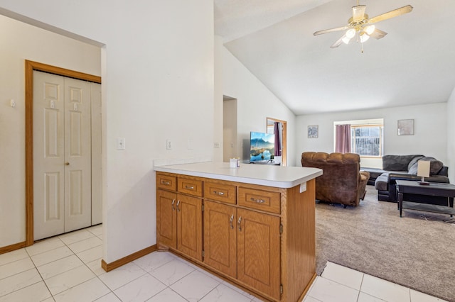 983 County Road D E, Vadnais Heights, MN 55109 - kitchen featuring open floor plan, light countertops, a ceiling fan, a peninsula, and lofted ceiling