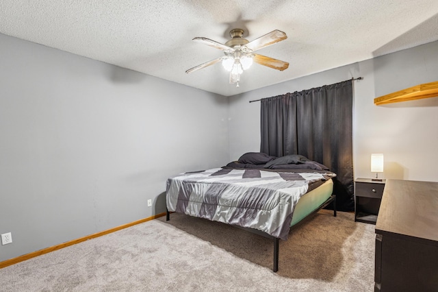 983 County Road D E, Vadnais Heights, MN 55109 - carpeted bedroom featuring baseboards, a textured ceiling, and ceiling fan