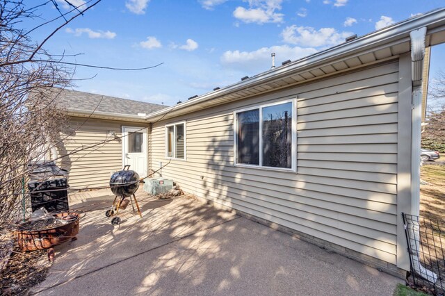 983 County Road D E, Vadnais Heights, MN 55109 - view of patio featuring grilling area