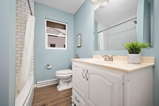 full bathroom with baseboard heating, hardwood / wood-style floors, toilet, shower / tub combo with curtain, and vanity