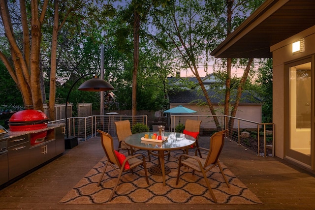 4540 Upton Ave S, Minneapolis, MN 55410 - view of patio with a wooden deck, exterior kitchen, outdoor dining area, and fence