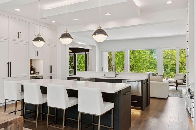 4540 Upton Ave S, Minneapolis, MN 55410 - kitchen featuring a sink, a center island, dishwasher, recessed lighting, and light countertops