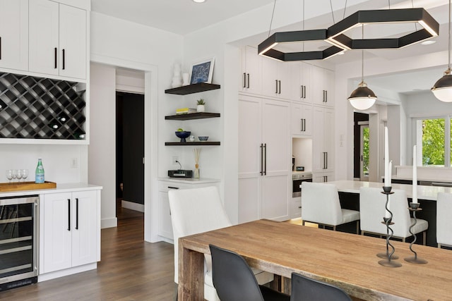4540 Upton Ave S, Minneapolis, MN 55410 - dining room with beverage cooler, a dry bar, dark wood finished floors, recessed lighting, and baseboards