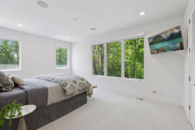 4540 Upton Ave S, Minneapolis, MN 55410 - carpeted bedroom with multiple windows, baseboards, and recessed lighting