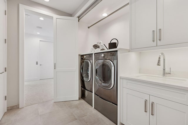 4540 Upton Ave S, Minneapolis, MN 55410 - washroom with independent washer and dryer, a sink, recessed lighting, and light tile patterned floors