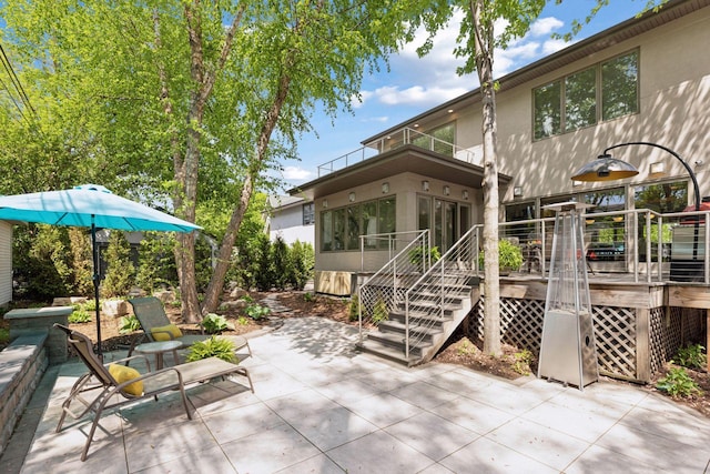 4540 Upton Ave S, Minneapolis, MN 55410 - view of patio featuring a balcony and a deck