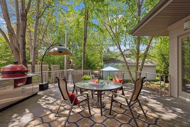 4540 Upton Ave S, Minneapolis, MN 55410 - view of patio / terrace with outdoor dining space, grilling area, and a deck