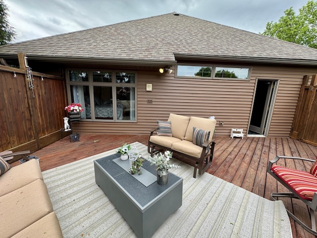 wooden terrace featuring an outdoor hangout area