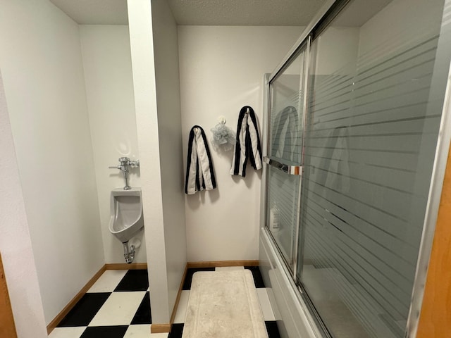 bathroom featuring enclosed tub / shower combo