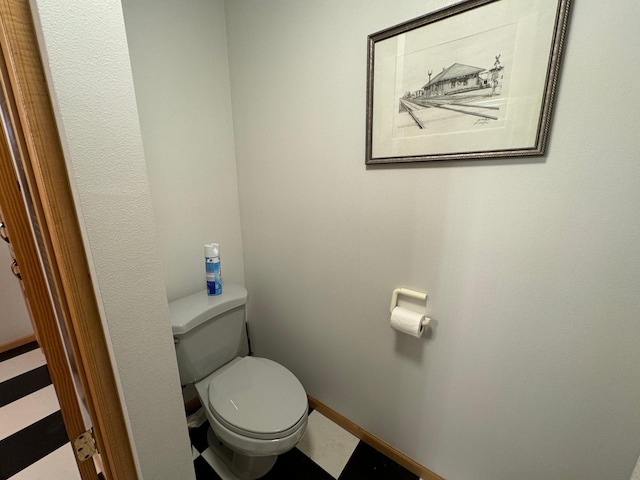 bathroom featuring toilet