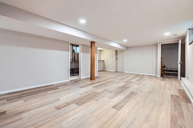 basement featuring light hardwood / wood-style flooring