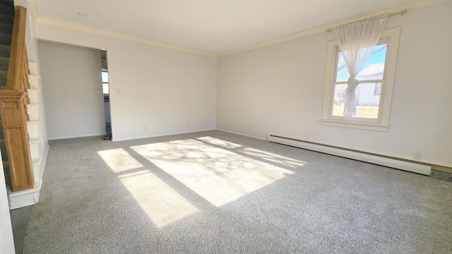 unfurnished room featuring baseboard heating, crown molding, and carpet floors