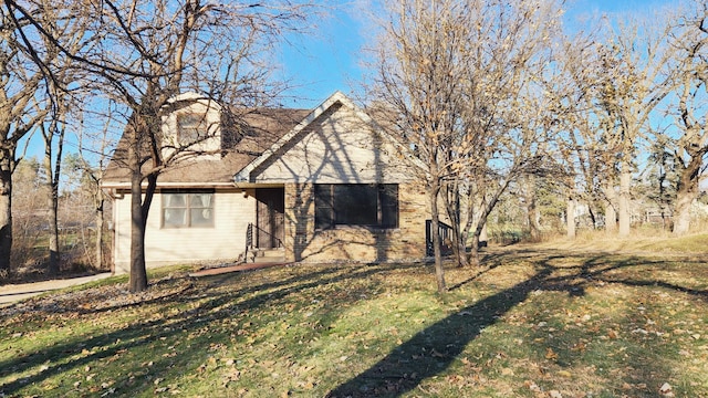 exterior space with a front yard