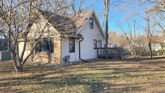 view of property exterior featuring a yard