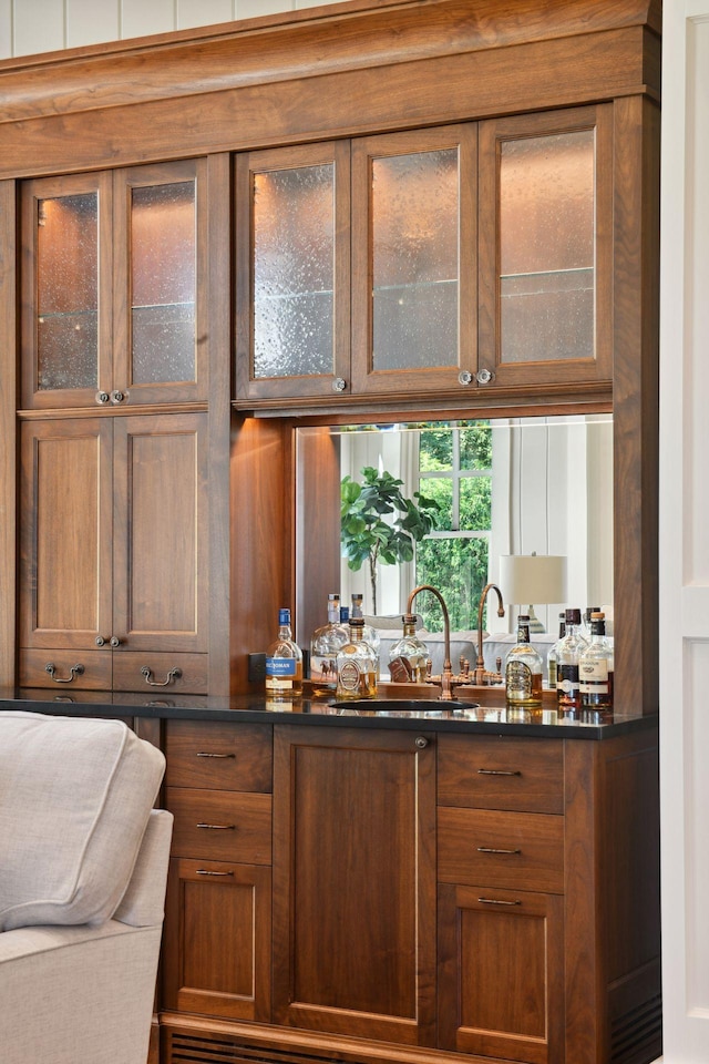 bar featuring a sink