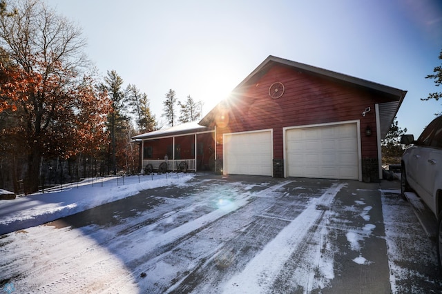 view of snow covered garage