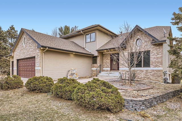 view of front of home with a garage