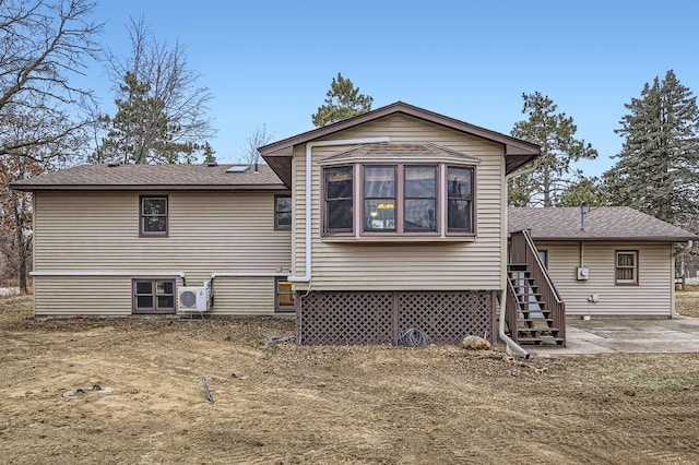 rear view of property with a patio area