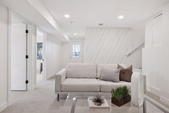 living room featuring light colored carpet