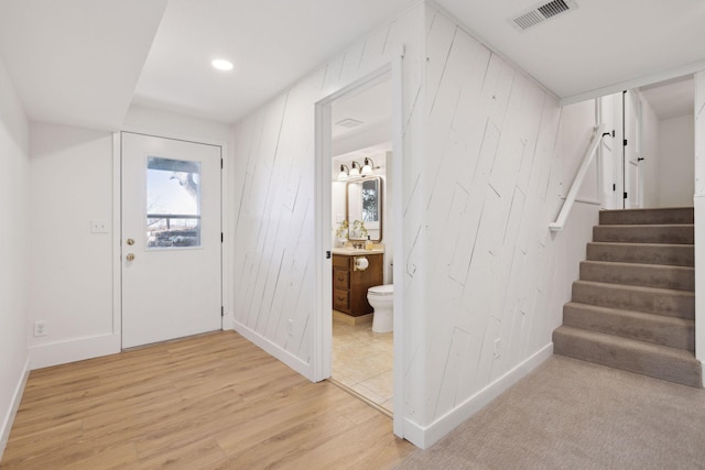 foyer with light wood-type flooring