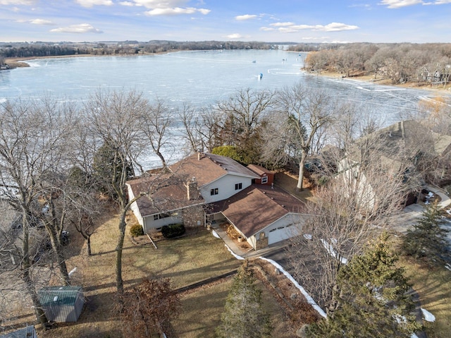 drone / aerial view with a water view