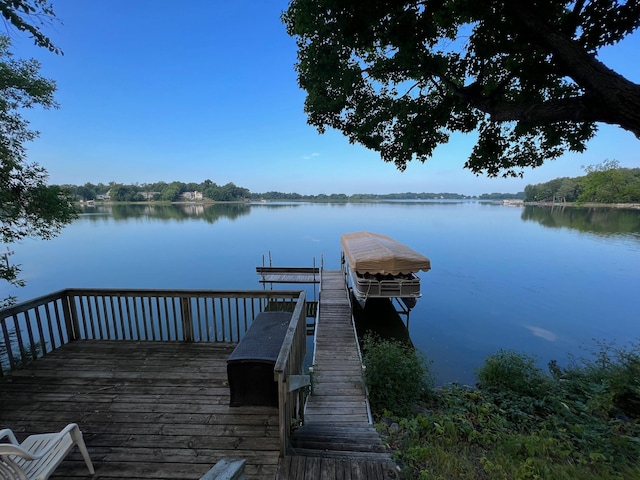 view of dock with a water view