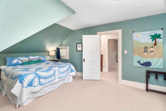 bedroom featuring carpet flooring and lofted ceiling