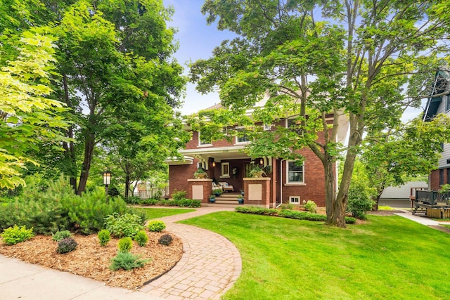 2328 3rd St, Duluth, MN 55812 - view of front of house with brick siding and a front yard