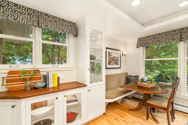 2328 3rd St, Duluth, MN 55812 - bar with ornamental molding, light wood-style floors, recessed lighting, and baseboard heating