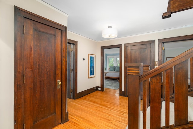 2328 3rd St, Duluth, MN 55812 - hallway featuring light wood finished floors and stairway