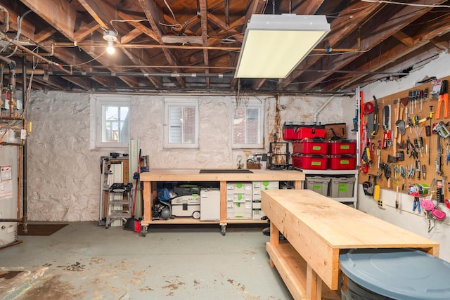 2328 3rd St, Duluth, MN 55812 - below grade area with a workshop area and strapped water heater