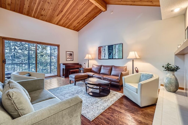 living area with wood ceiling, high vaulted ceiling, wood finished floors, and beamed ceiling