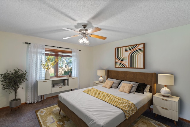 carpeted bedroom with ceiling fan and a textured ceiling