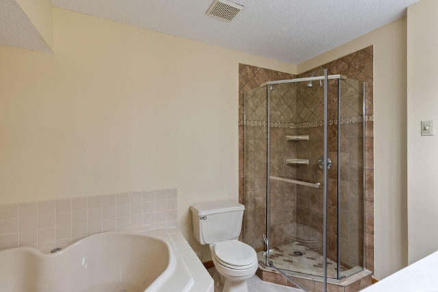 bathroom featuring tile patterned flooring, a textured ceiling, toilet, and independent shower and bath