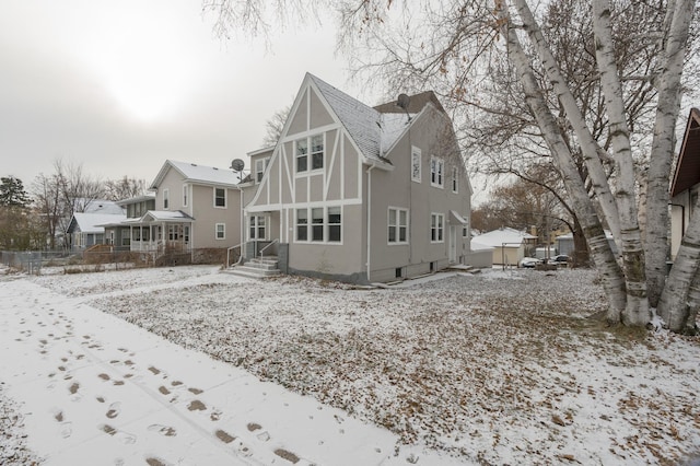 view of snow covered house