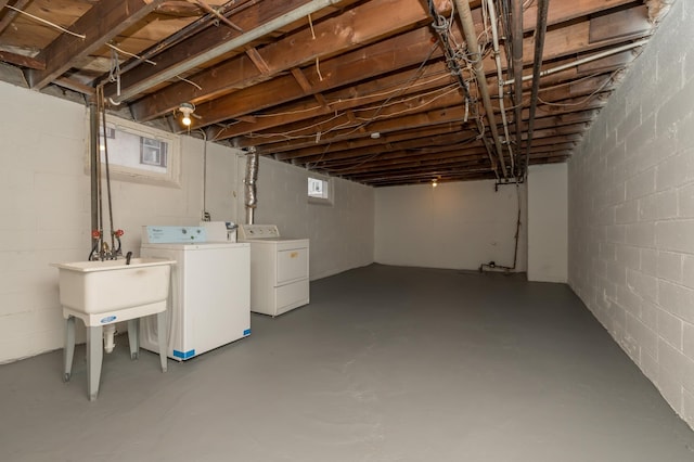 basement featuring washing machine and dryer